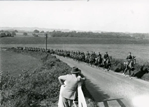 Hedge Prints: Life Guards riding up Duncton Hill, being watched by a farmer, August 1936