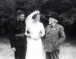 George Garland Prints: You look after my girl'- September 1944