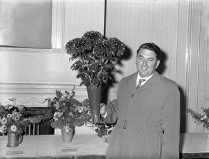 Competition Prints: Man with chrysanthemums at show, 2 November 1961