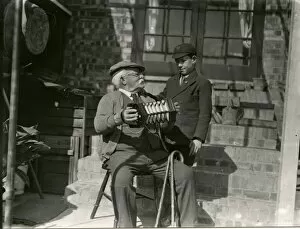 Images Dated 17th February 2015: Old man with his accordian, April 1938