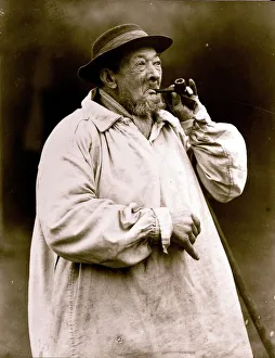 Old Shep lighting his pipe, January 1925