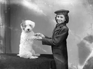 Images Dated 13th April 2015: Portrait of a young woman with her dog - 27 November 1943