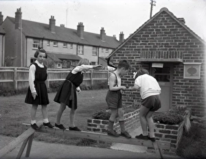 Uniform Prints: Schoolchildren in playground at Lancastrian Infants School, Chichester, May 1956
