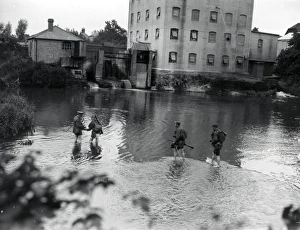 Soldiers paddling in mill pond, near Duncton, Sussex, August 1936