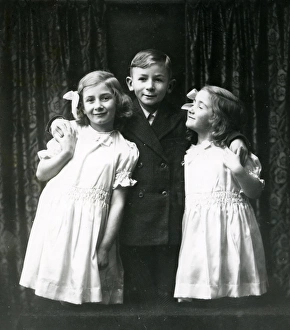 Fashion Prints: Studio portrait of three children, December 1935