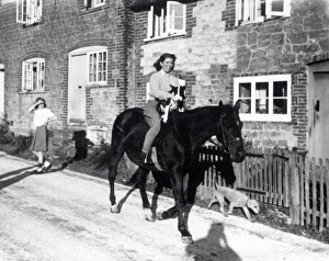 Taking the dog for a walk - 4 November 1946 Taking the dog for a walk - 4 November 1946