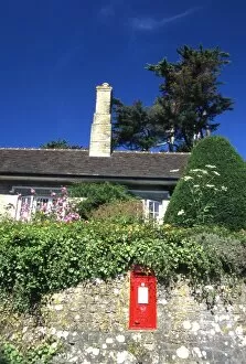Images Dated 24th June 2014: Traditional red post box at Bignor, West Sussex