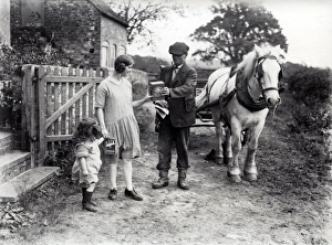 Village carrier out on deliveries with his horse and cart