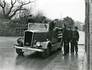 Groom Prints: Wedding couple getting out of fire brigade vehicle, January 1945