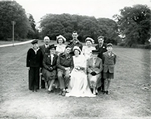 Wedding party posing in church grounds at Ebernoe, Sussex, 1940s Wedding party posing in church grounds at Ebernoe, Sussex, 1940s
