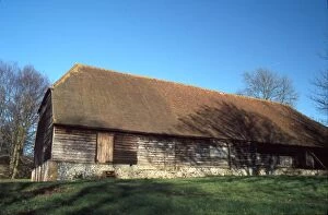 David Johnston Collection: Wooden and flint barn at Watergate House Farm, West Marden, West Sussex