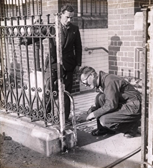 World War Two Prints: Workmen removing iron railings [1939-1945]