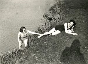 Images Dated 6th October 2014: Young ladies posing on a river bank in Stopham, March 1938